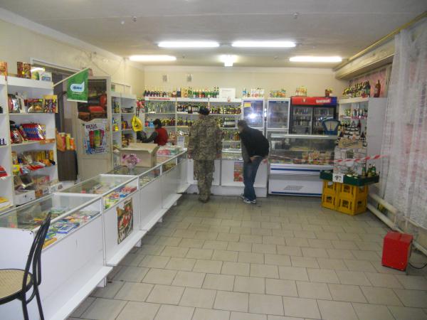 Our tour guide and his driver buying cigarettes in the only shop in the area